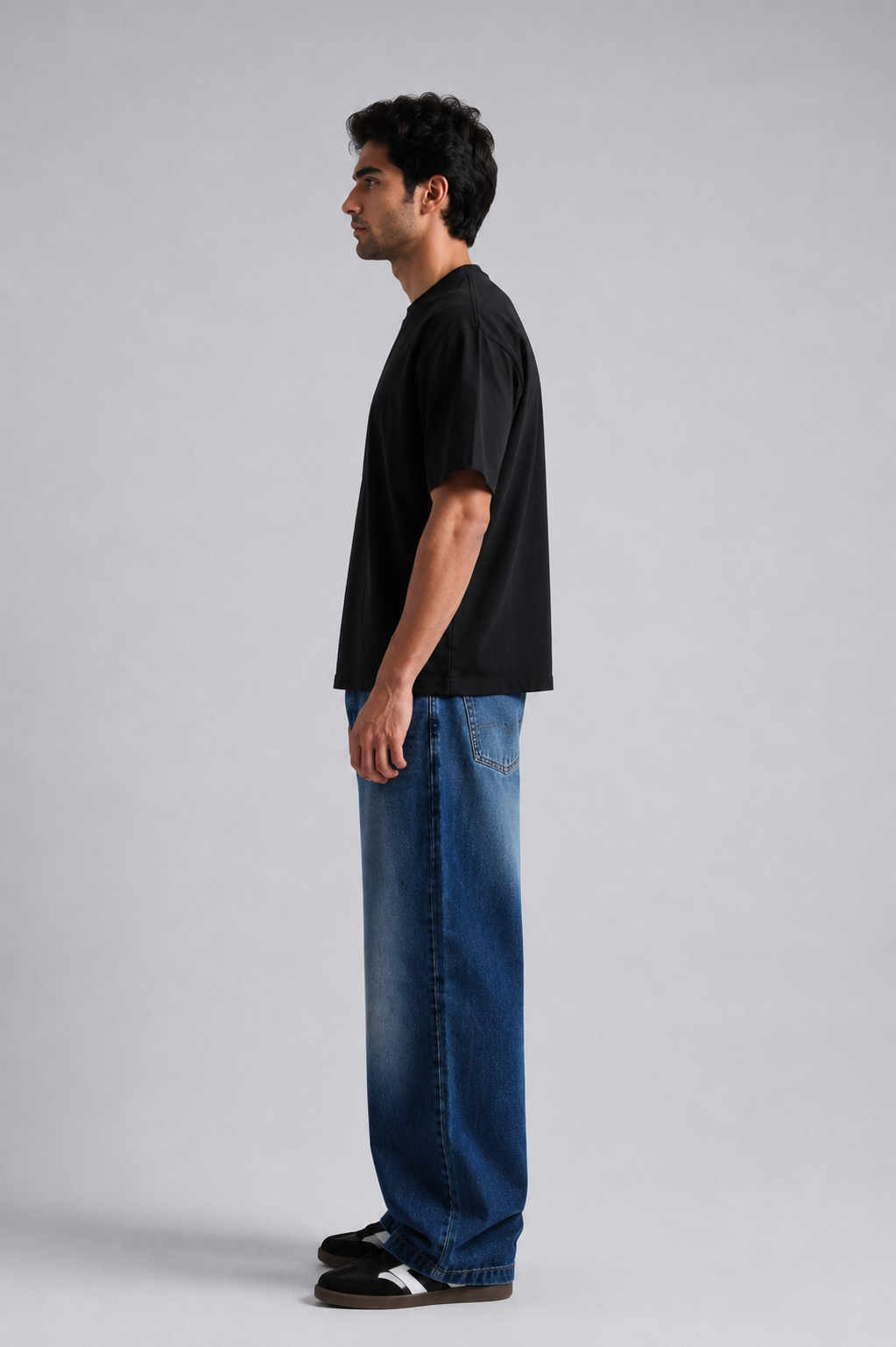 Side view of STARK REDEMPTION Tee premium oversized black t-shirt